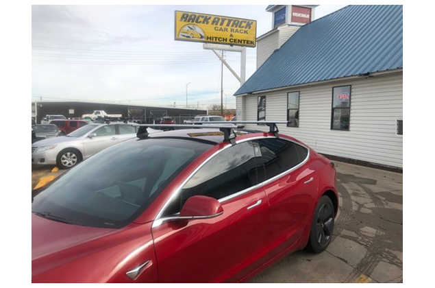 Dakdragers Tesla Model 3 rood schuin voor